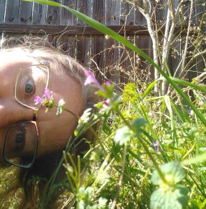 Me with purple weeds in bloom